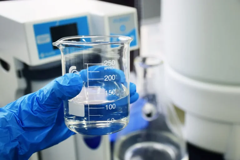 Chemical dosing sample in a laboratory beaker