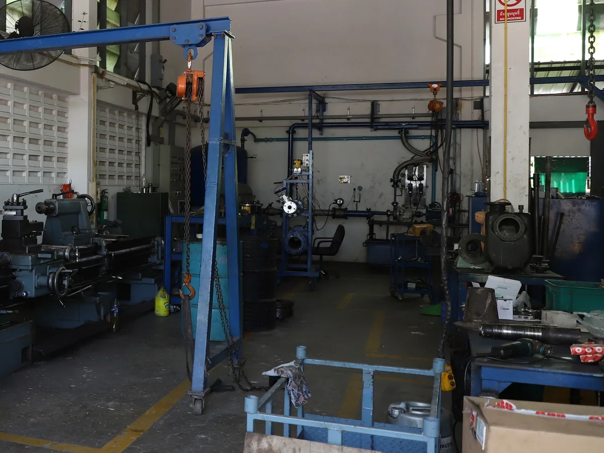 Plant Equipment pump service workshop with lathe, gantry crane and pump test bench